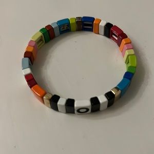 Roxanne Assoulin alphabet soup initial stretch bracelet. O. Multi color.